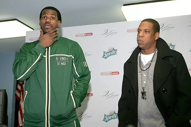 Superstar LeBron James and producer/rapper Shawn "Jay-Z" Carter speak to reporters before meeting with kids at the Dallas Boys & Girls Club on...